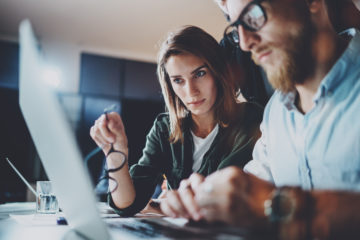 woman and man on computer